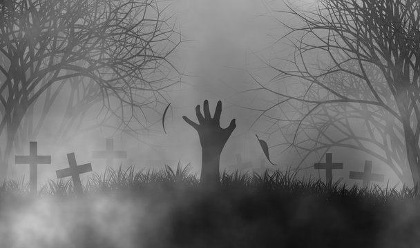 Halloween theme with hand of zombie pop-up from the ground in horror cemetery at night.