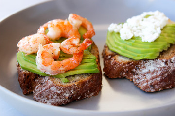 Healthy sandwiches with avocado and shrimp