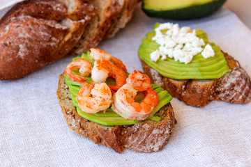 Healthy sandwiches with avocado and shrimp