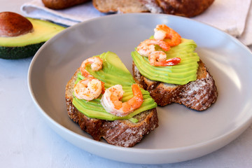 Healthy sandwiches with avocado and shrimp