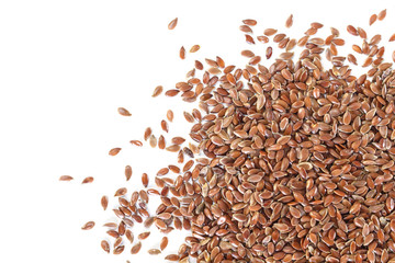Brown flax seed on white background.