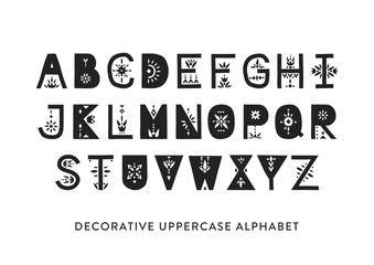 Vector display uppercase alphabet decorated with geometric folk patterns