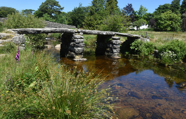 Fototapeta na wymiar Ancient stone Clapper Bridge, Dartmoor, England.