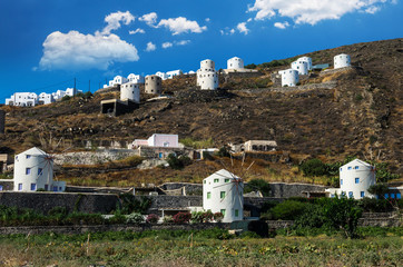 Fototapeta na wymiar Santorini island, Greece. Windmills near Oia village in Thira.