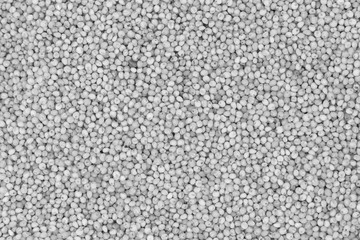 White seeds and grains of cereals background texture