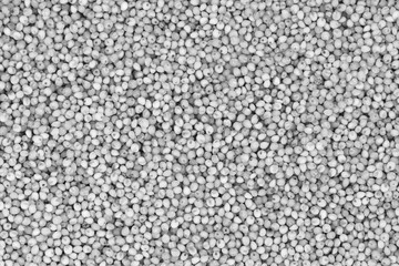 White seeds and grains of cereals background texture