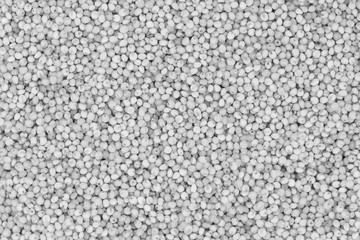 White seeds and grains of cereals background texture