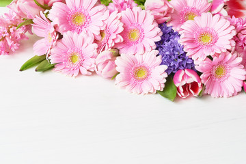 Pink daisy gerbera flowers on white background. Copy space. Holiday background.