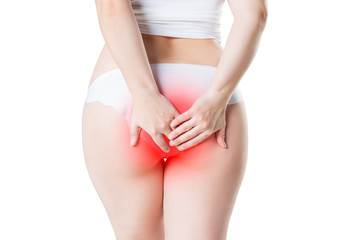 Woman suffering from hemorrhoids, anal pain isolated on white background - obrazy, fototapety, plakaty