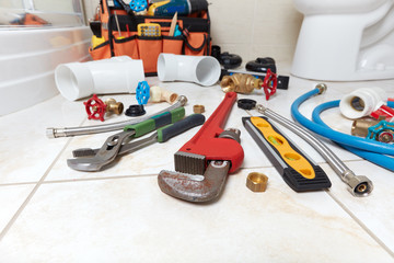 Plumbing tools in the bathroom .