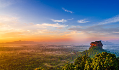Sunrise view to Sigiriya rock - Lion Rock - from Pidurangala Rock in Sri Lanka - obrazy, fototapety, plakaty