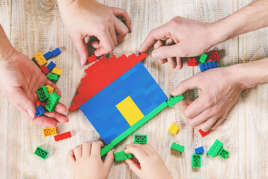 Build A Designer Lego House. Selective Background.