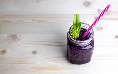 isolated on a white background purple fruit and vegetable smoothie