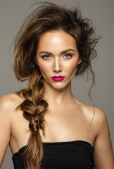 Beautiful fashion woman with braid