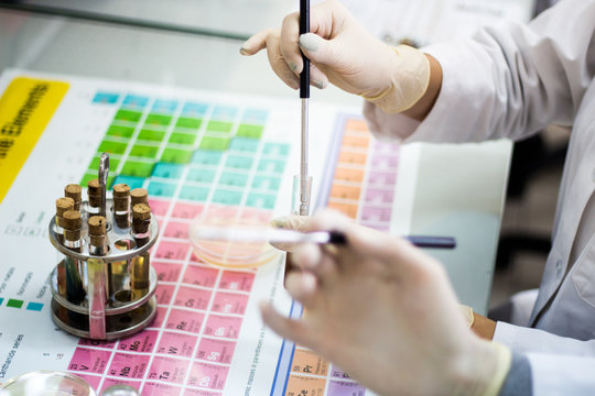 Chemist works in laboratory and gets various samples