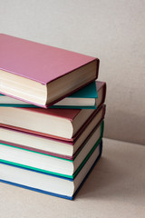 A stack of books on a crafting background. Education. Literature. Home library