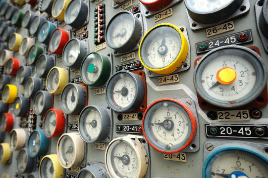 Manometers of the cooling system of reactor set on main control board at the control operations room