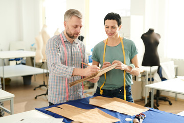 Colleagues in tailoring shop