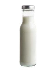 Milk in glass bottle isolated on white background.