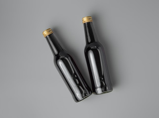 Mini wine bottle on grey background for print design and mock up