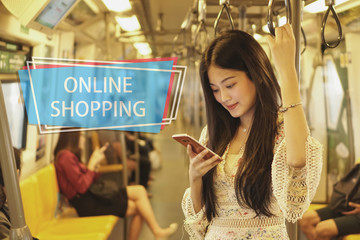 Young woman looking at credit card and smartphone,Online Shopping