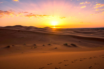 Fototapeta na wymiar The beauty of the sand dunes in the Sahara Desert in Morocco.
