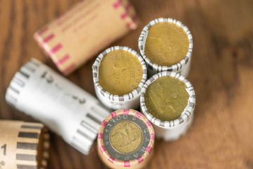 Wrapped stacks of canadian dollar coins to allow easy counting