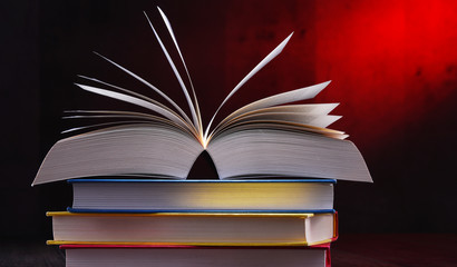 Composition with open book on the table