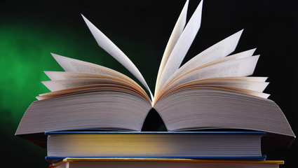 Composition with open book on the table