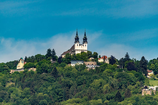 City views of the state capital Linz Austria with churches, cathedral, mountain P&ouml;hlberg