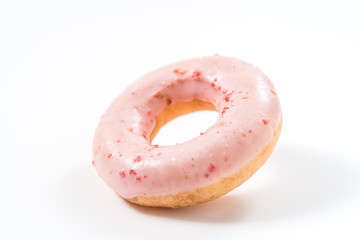 Strawberry donut on a white background.