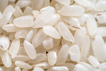 Fototapeta na wymiar background from white rice medium closeup