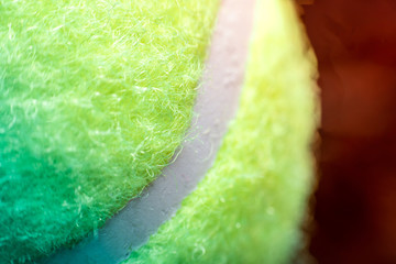 Tennis ball close up macro image as background