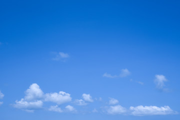 Blue sky background and white clouds with copy space, good for message and background.