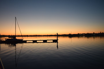 Fototapeta na wymiar sunsets boats sea