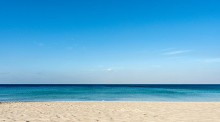 Fototapeta na wymiar White sand with beautiful beach and tropical sea clear blue sky over sea