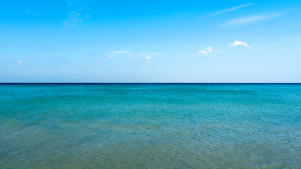 Fototapeta na wymiar Beautiful tropical sea with clear blue sky background