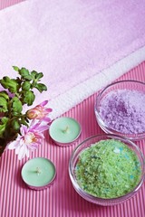 Obraz na płótnie Canvas Colorful bath salt on pink background.Healthy skin care.