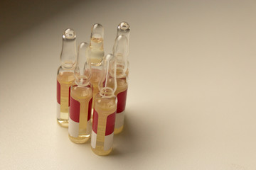 Fototapeta premium Ampoules are on the white windowsill