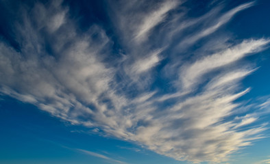 Naklejka na ściany i meble Beautiful background of blue sky and white clouds