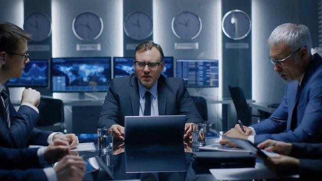 CEO of the Company Holds Briefing with Executives and Top Managers, Making a Speech, Holding a Vote in the Conference Room. Businesspeople Strategizing and Talking at the Business Meeting