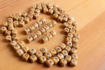 Mothers day concept - wooden word blocks form Happy mothers day.