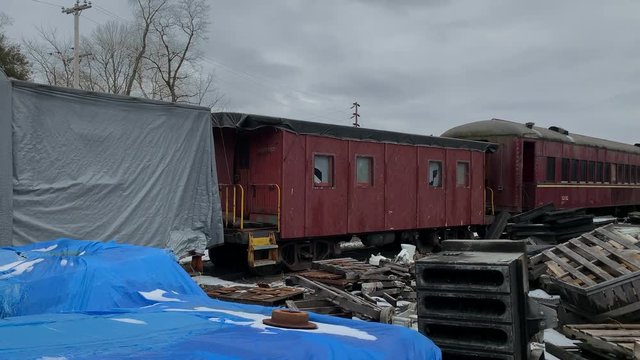 Broken train cabins in junk yard apocalyptic