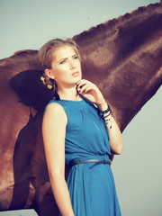 portrait of young girl  with  horse
