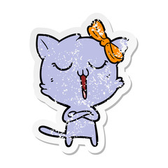 distressed sticker of a cartoon cat