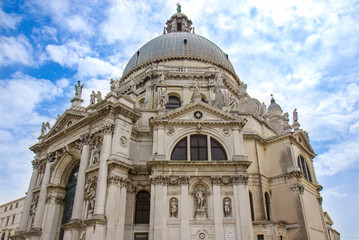 Fototapeta na wymiar Basilica Santa Maria della Salute on embankment of Canal Grande in Venice, Italy