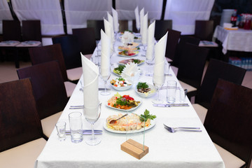 Festive table with bright snacks