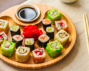 rolls and sushi set mix different tastes. food background. top