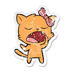 distressed sticker of a cartoon yawning cat