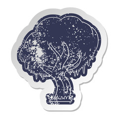 distressed old sticker of a green tree